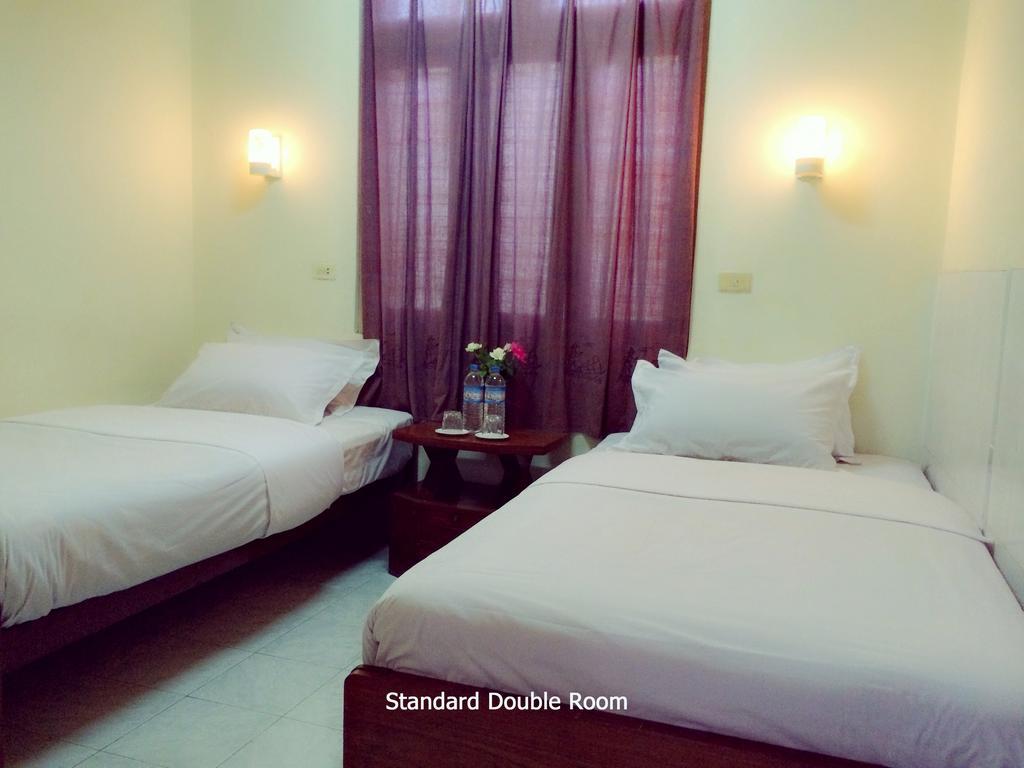 Joy Hotel Nyaung Shwe Quarto foto