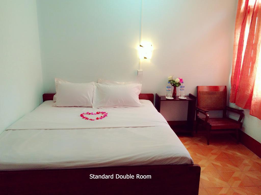 Joy Hotel Nyaung Shwe Quarto foto