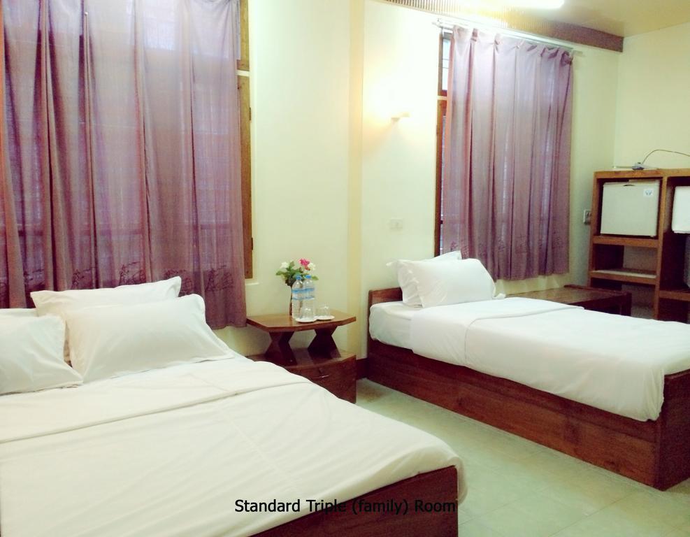 Joy Hotel Nyaung Shwe Quarto foto